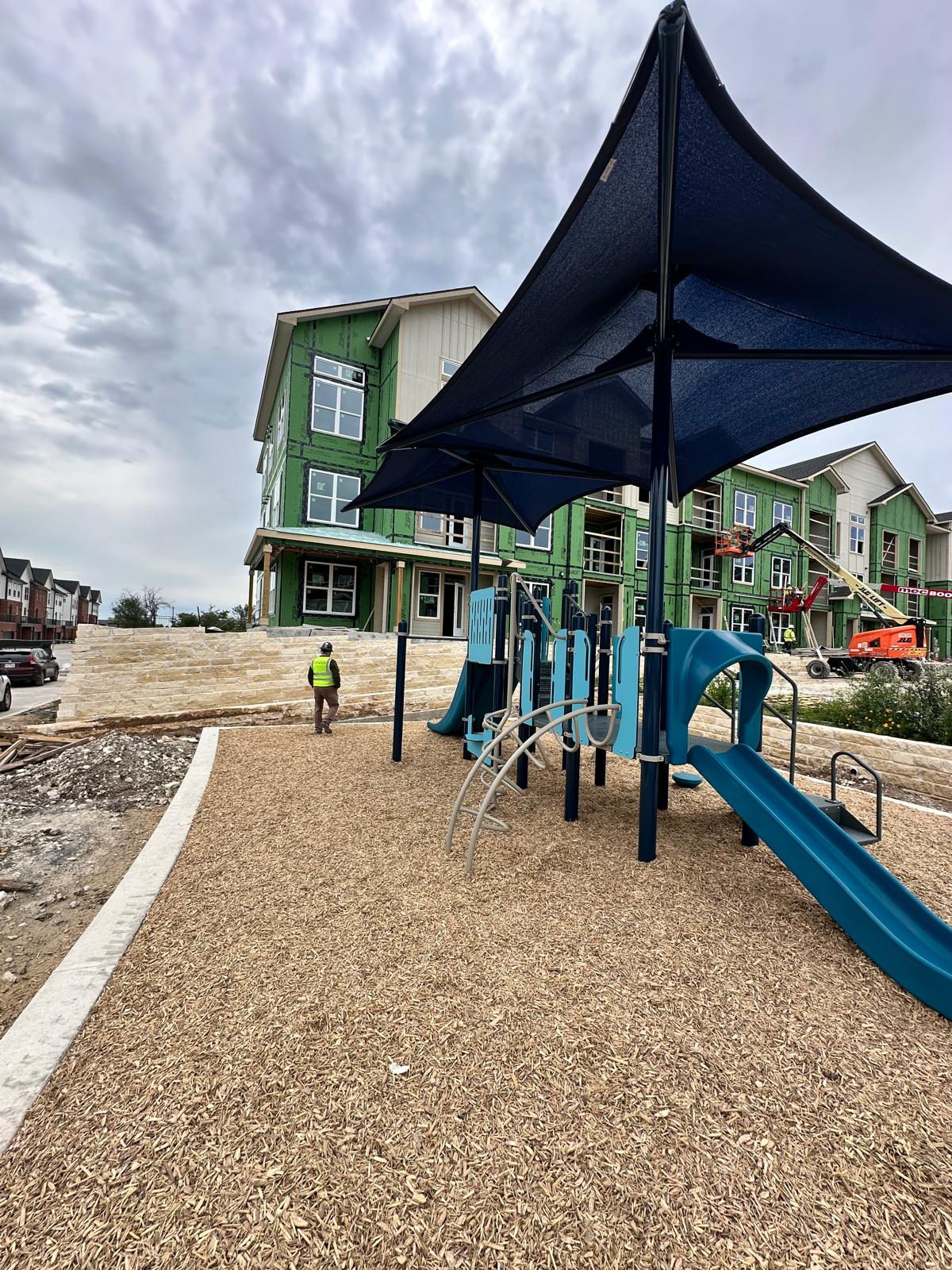 Completed playground with shade structure